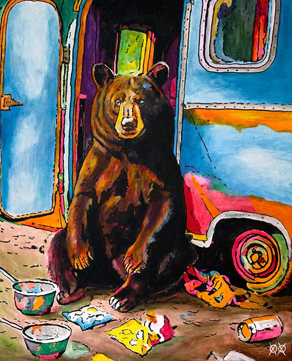 Výrazne farebný obraz. Záber na auto s vlečkou, na ktorej sedí dievčina s dlhými čiernymi vlasmi v kovbojskom klobúku a v rifliach. V rukách drží gitaru, na ktorej hrá. Auto ide po poľnej ceste, v pozadí vidieť malý dom a zeleň. 